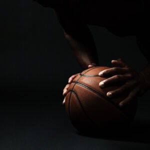 Cropped photo of afro american basketball player,  doing pushup