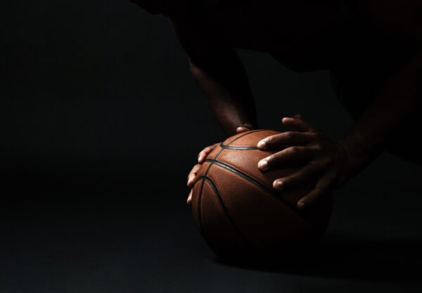 Cropped photo of afro american basketball player,  doing pushup